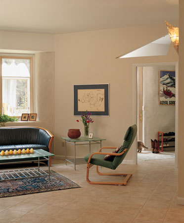 
Rich laid all of the tile, which was chosen because it’s an ideal surface for radiant heat. Interior drywall meets the curved window wall for a seamless finish.
